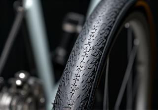 Close up of performance road bike tires on a bicycle wheel